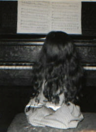 Candace at piano-age 4